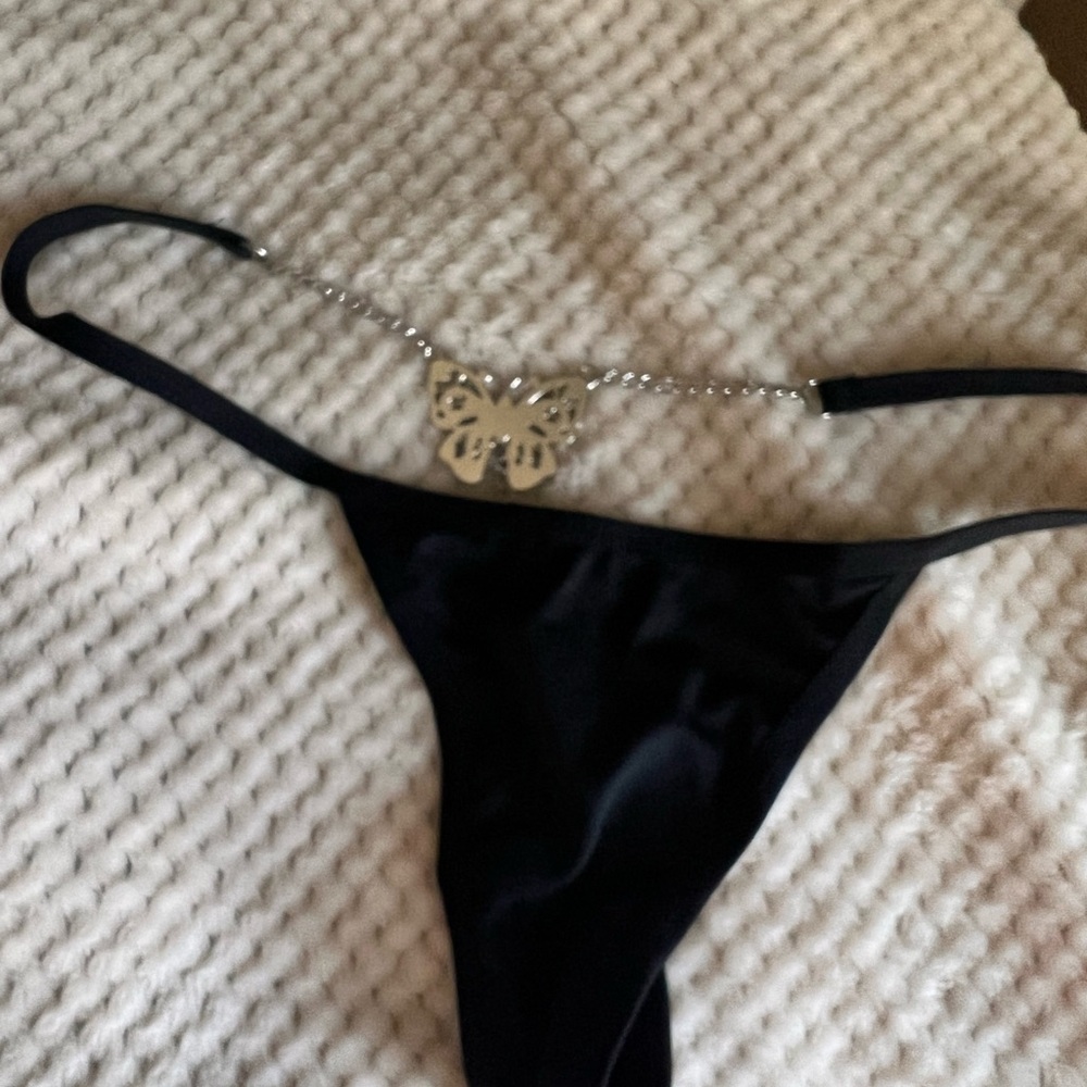 NWOT Elegant Black Thong with Butterfly Detail M